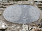 The plaque at Folly Tower at Plas Brondanw